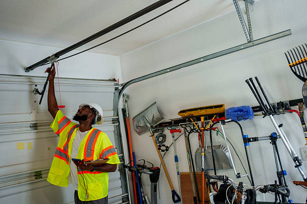 Professional Garage Door Panel Replacement technician working in Manor, PA